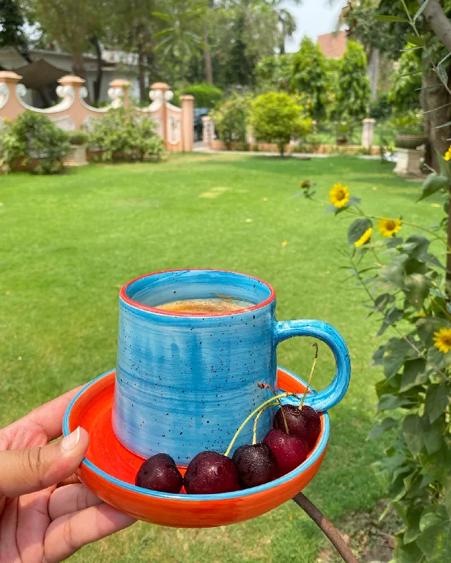 custom coffee cups for Christmas -Ferozi Vigo mug with bright orange  snacking plate